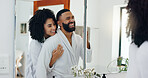 Mirror, laugh and hug with couple in bathroom for hygiene,  morning routine and together in home. Funny joke, smile or happy with man, woman and reflection in apartment for love, beauty or bonding