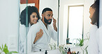 Hug, mirror and couple in bathroom, skincare and wellness with grooming, support and treatment. Healing cosmetics, home and man with woman, embrace and reflection with morning routine and beauty