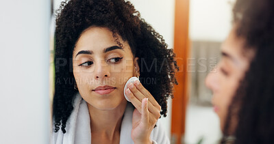 Buy stock photo Woman, cotton patch and mirror with skincare in bathroom for makeup removal or cosmetics in home. Female person, face and reflection with wipe for anti aging skin, cleanse or facial cleaning in house