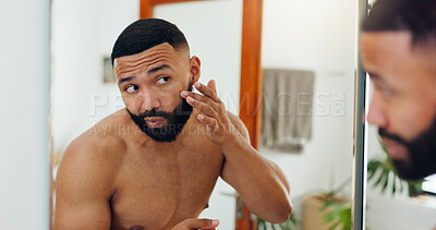 Buy stock photo Skincare, man and mirror in bathroom for inspection, check acne and beard growth in home. Person, reflection and touch face in apartment for grooming, dermatology and topless in morning routine