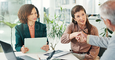 Buy stock photo Handshake, meeting and business people for partnership, merger or thank you in office. B2B deal, team and shaking hands with tech, documents or client introduction for collaboration or agreement