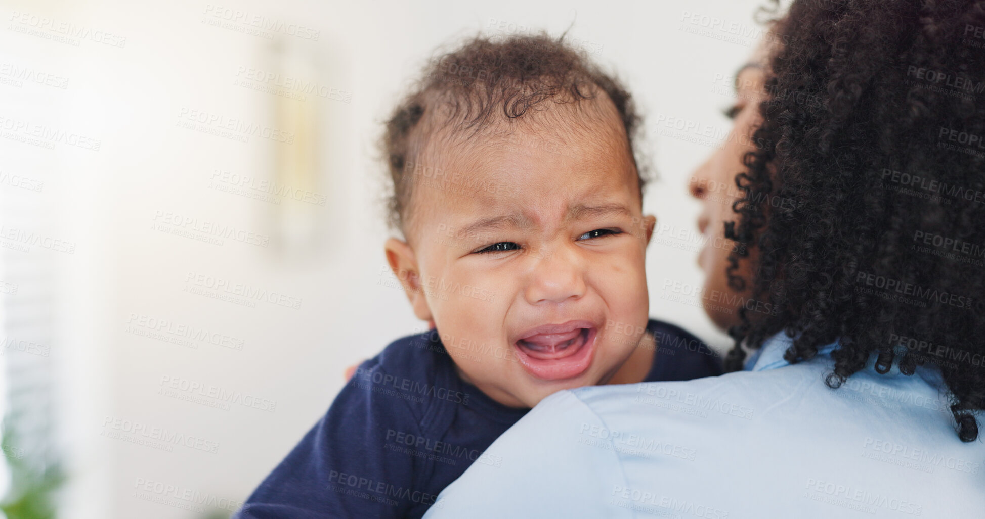 Buy stock photo Family, mother and comfort crying baby in home with frustration, teething and hungry. Single mom, woman and attention to sad kid for infant care, space and console child with parenting and connection