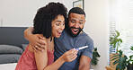 Surprise, couple and hug with pregnancy test at house of positive result, good news and ivf success. Happy, people and excited with fertility kit, family planning and pregnant announcement for baby