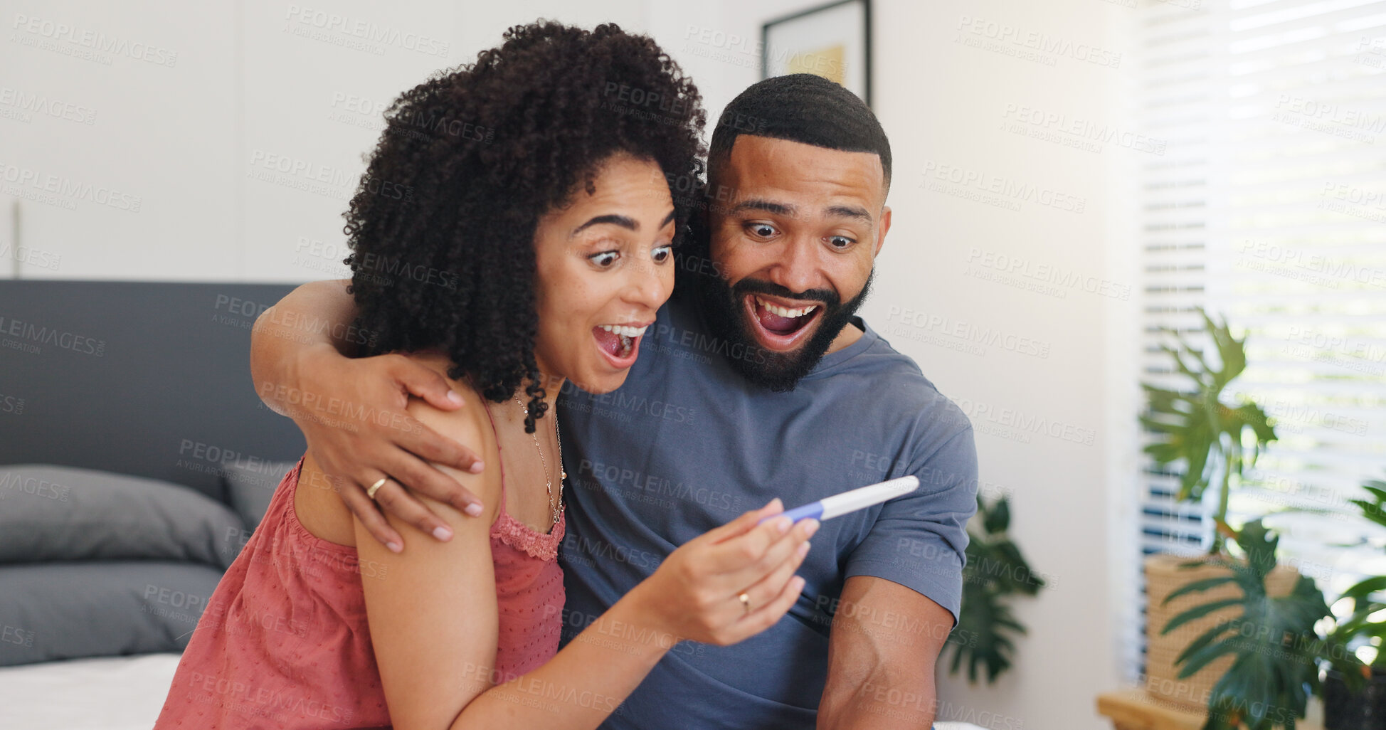 Buy stock photo Surprise, couple and hug with pregnancy test at house of positive result, good news and IVF success. Happy, people and excited with fertility kit, family planning and pregnant announcement for baby