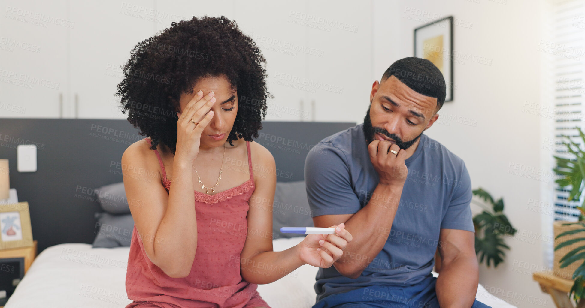 Buy stock photo Frustrated couple, pregnancy test or disagreement with stress for mistake in bedroom or home. Nervous man, woman or worry with anxiety, maternity stick or positive results in bed for concern in house