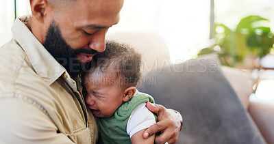 Buy stock photo Home, father and comfort crying baby with bonding together, hungry and discomfort with teething. Single dad, people and console sad infant in living room with attention, parenting and love connection