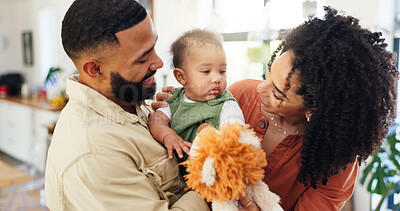 Buy stock photo Parents, baby and happy with plushy toys in home for bonding, care and love with connection in morning. People, mother and father with infant child, lion doll or smile with play at family house