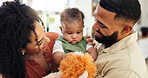 Home, baby and parents with teddy bear, love and bonding together with happiness, care and playful. Apartment, family or mother with father, infant and fluffy toy with connection or child development
