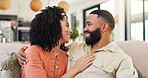 Hug, couple and bonding in lounge, love and romance in home, smile or affection on weekend or break. Happy, man and woman in living room, embrace and free time in house, relationship and together