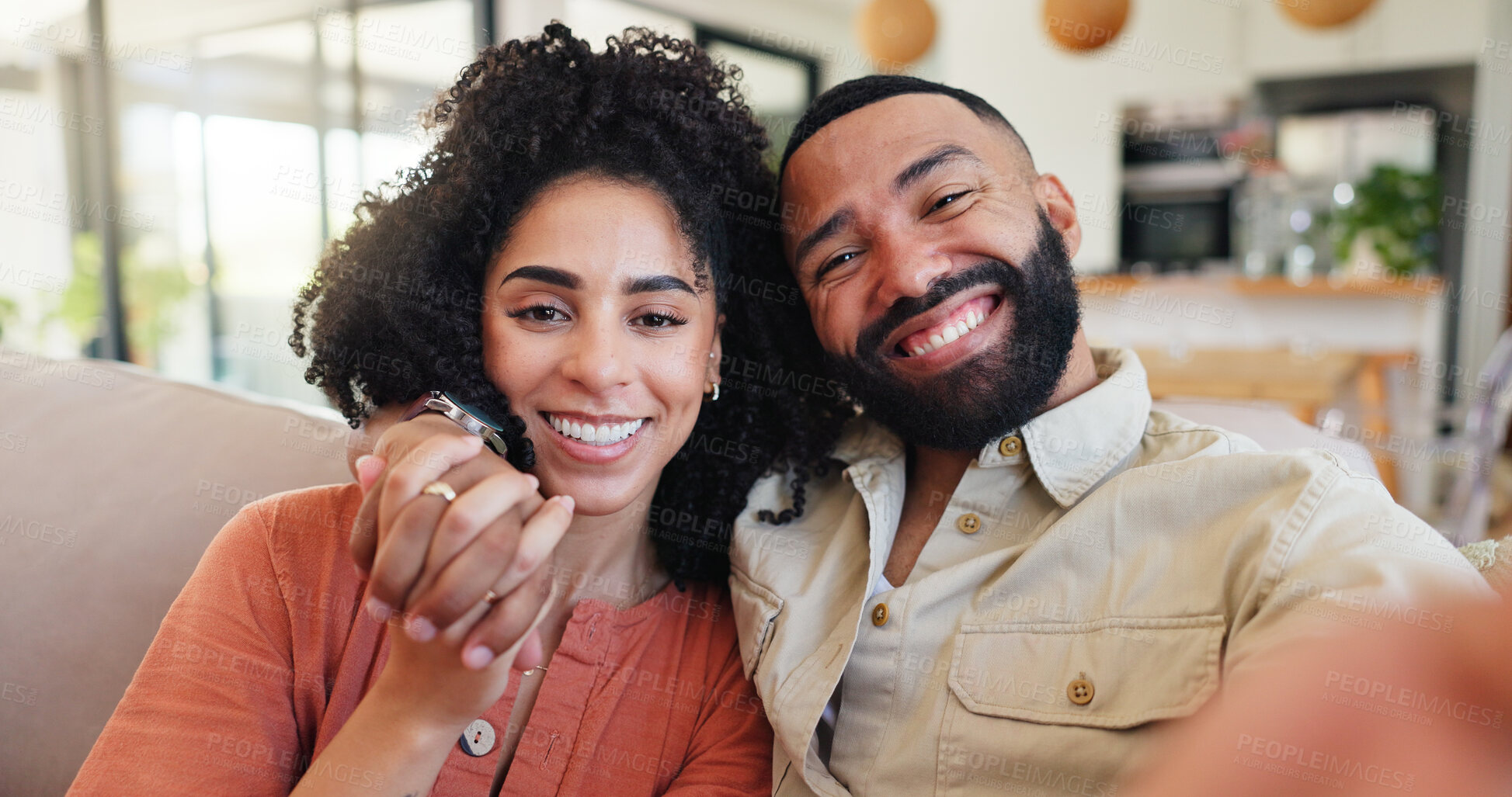 Buy stock photo Couple, selfie and happy with portrait on sofa in home, love or connection with hug in lounge. Man, woman or embrace with smile for photography, profile picture POV or social media post in Costa Rica