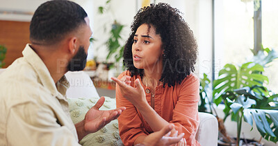 Buy stock photo Arguing, couple and angry in home, conversation or disagreement in living room or marriage problems. Conflict, man and fight with woman, liar and people with toxic relationship, upset and emotions