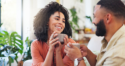 Buy stock photo Woman, couple and happy with coffee on sofa with talk, relax and discussion with drinks in home. Person, partnership and smile for conversation, listen or tea cup on couch in living room at apartment