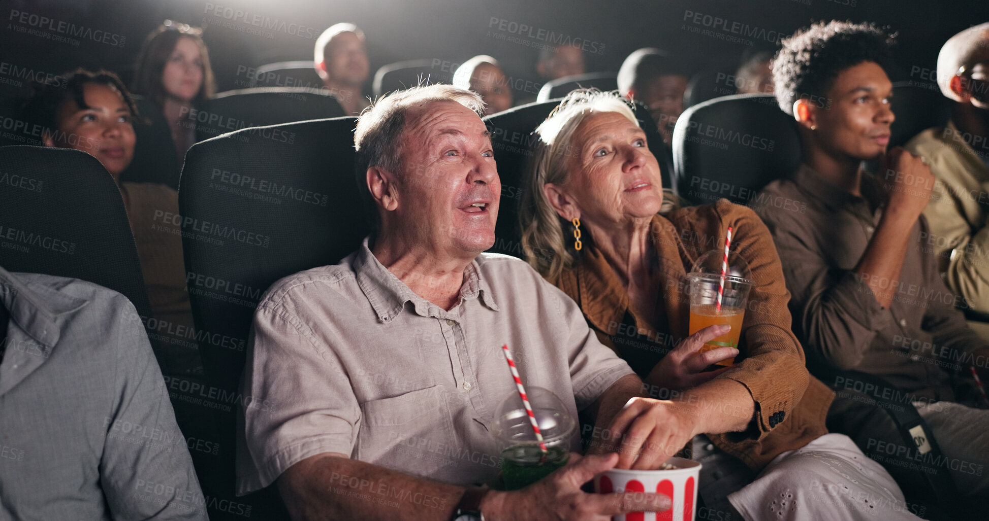 Buy stock photo Movie, theatre and senior couple with popcorn in cinema for entertainment, experience and watching film. Retirement, marriage and elderly man and woman with snacks for screening, premiere and film