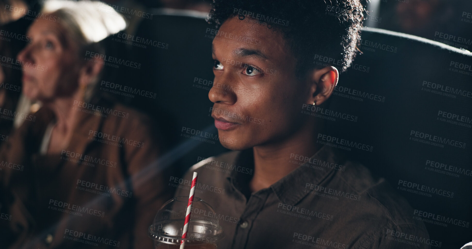 Buy stock photo Movie theater, audience and man with drink, premiere or reaction for entertainment, dark or weekend. Watching, film and person with beverage for break, cinema and spectator at night and projection