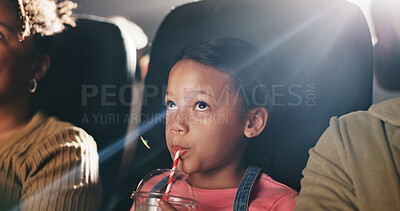 Buy stock photo Movie, theatre and child with drink in cinema for entertainment, experience and watching cartoon. Family, parents and girl with snacks for screening, animation and film audience for production