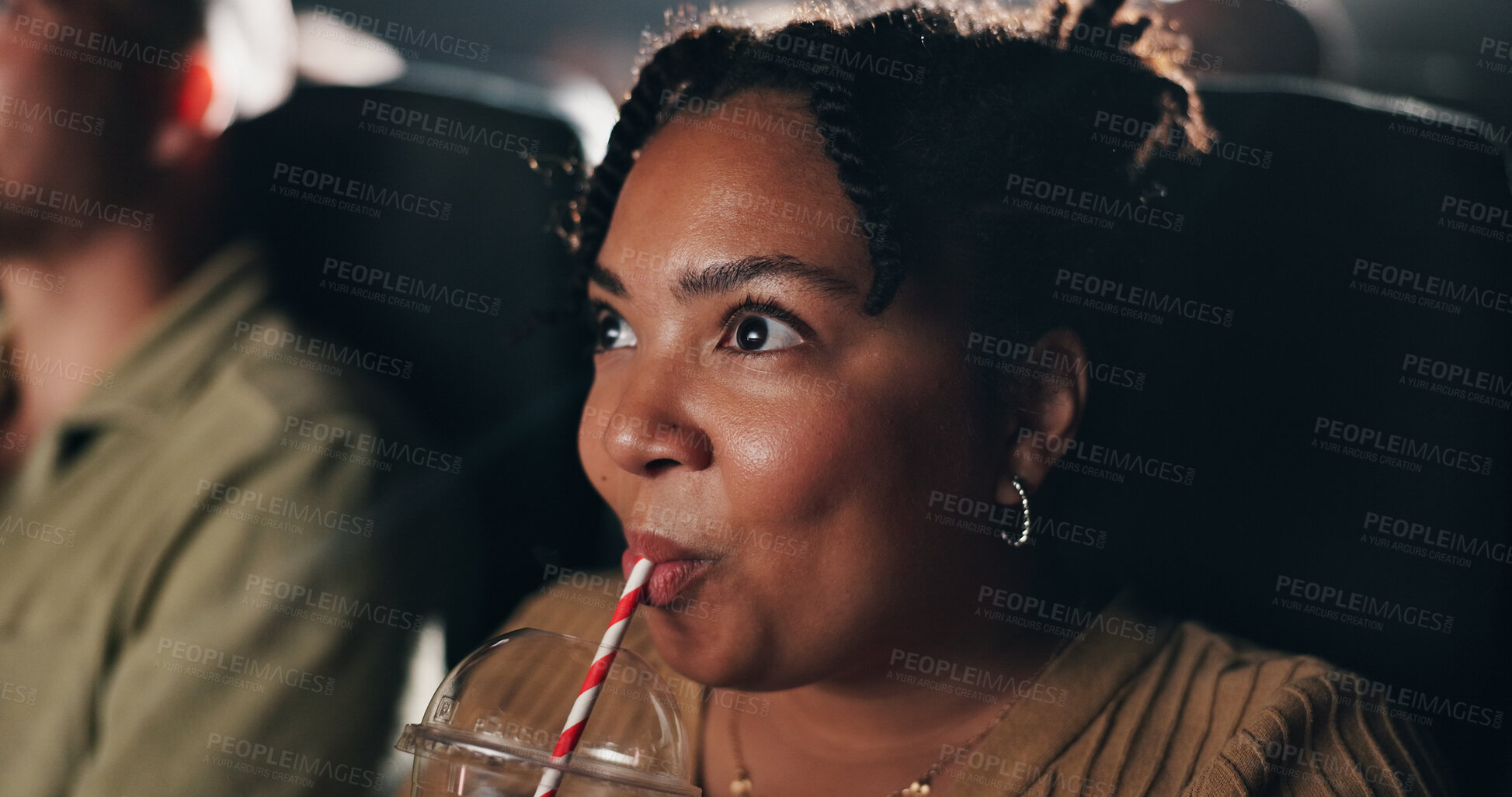 Buy stock photo Movie theater, audience and woman with drink, entertainment or reaction for premiere, dark or break. Watching, film and person with beverage for weekend, cinema and spectator at night and projection