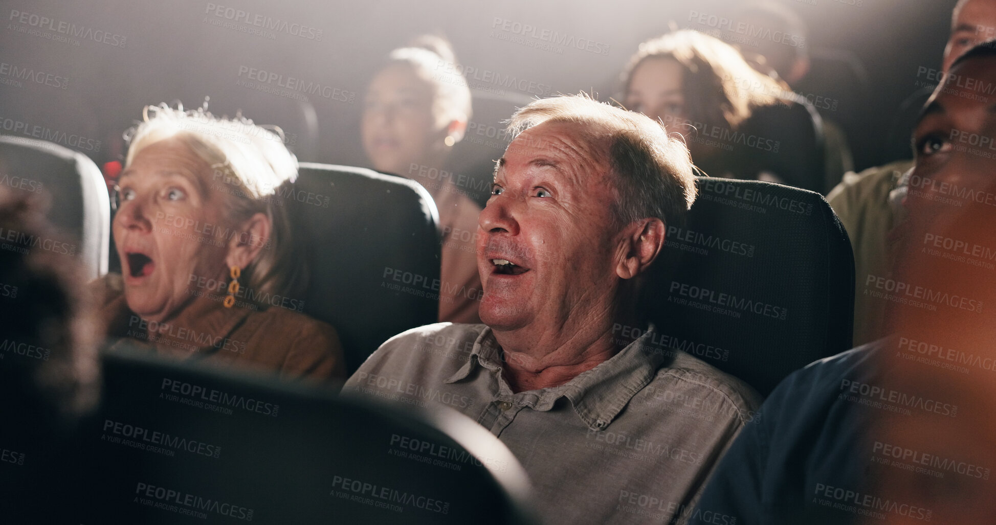 Buy stock photo Horror, man and movie in theater with shock for spooky scene, thriller premiere and entertainment. Film screening, senior people and surprise with terror in cinema for scary show or intense storyline