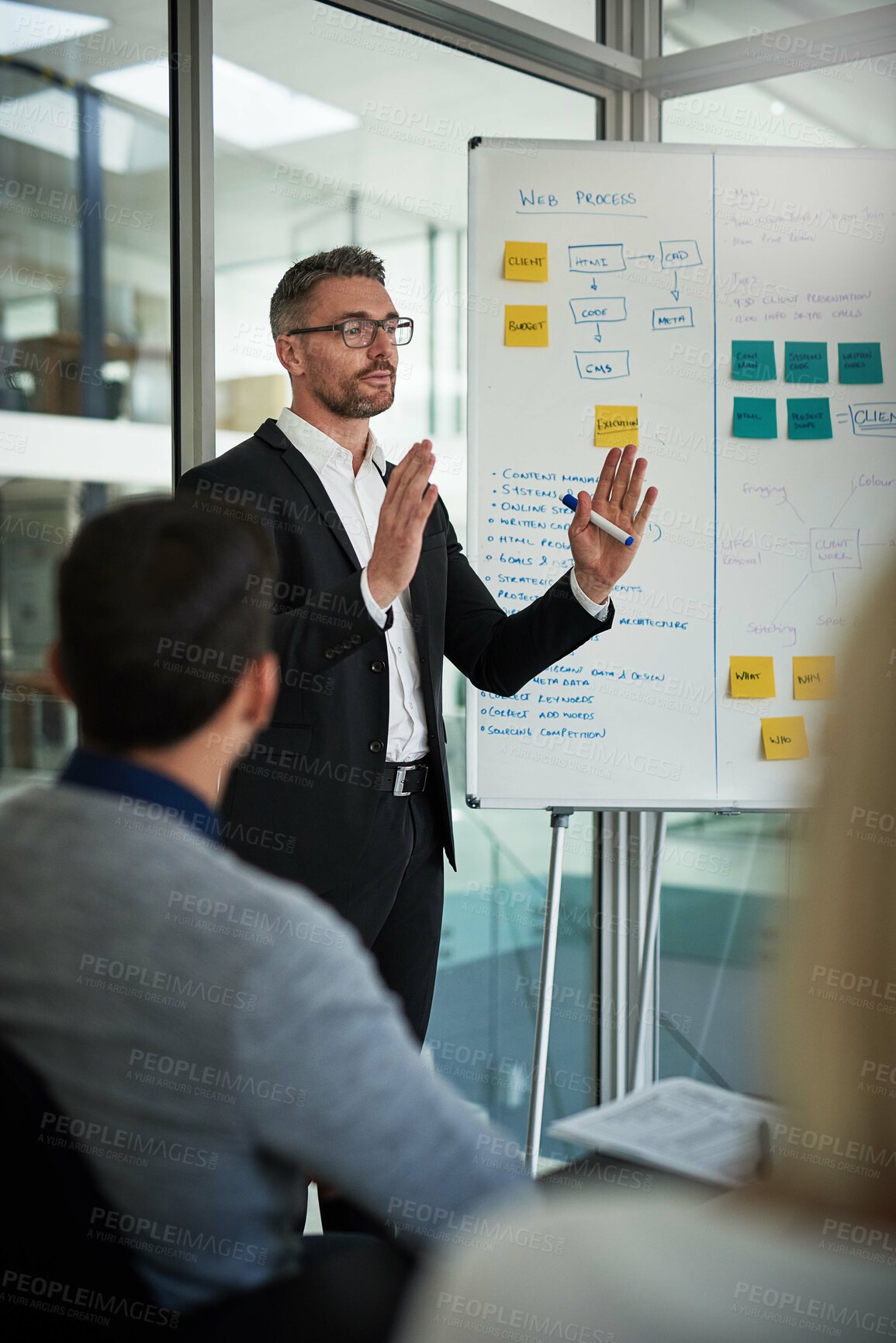 Buy stock photo Mature man, presentation and business strategy for planning, budget and project management in office. Executive, workshop and meeting with company employee for training, brainstorming and proposal