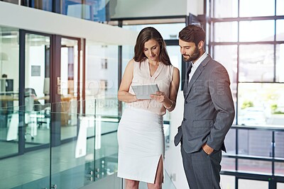 Buy stock photo Happy, business people and tablet for communication, discussion and collaboration on company report. Corporate man and woman with tech for planning, teamwork and conversation on review in office