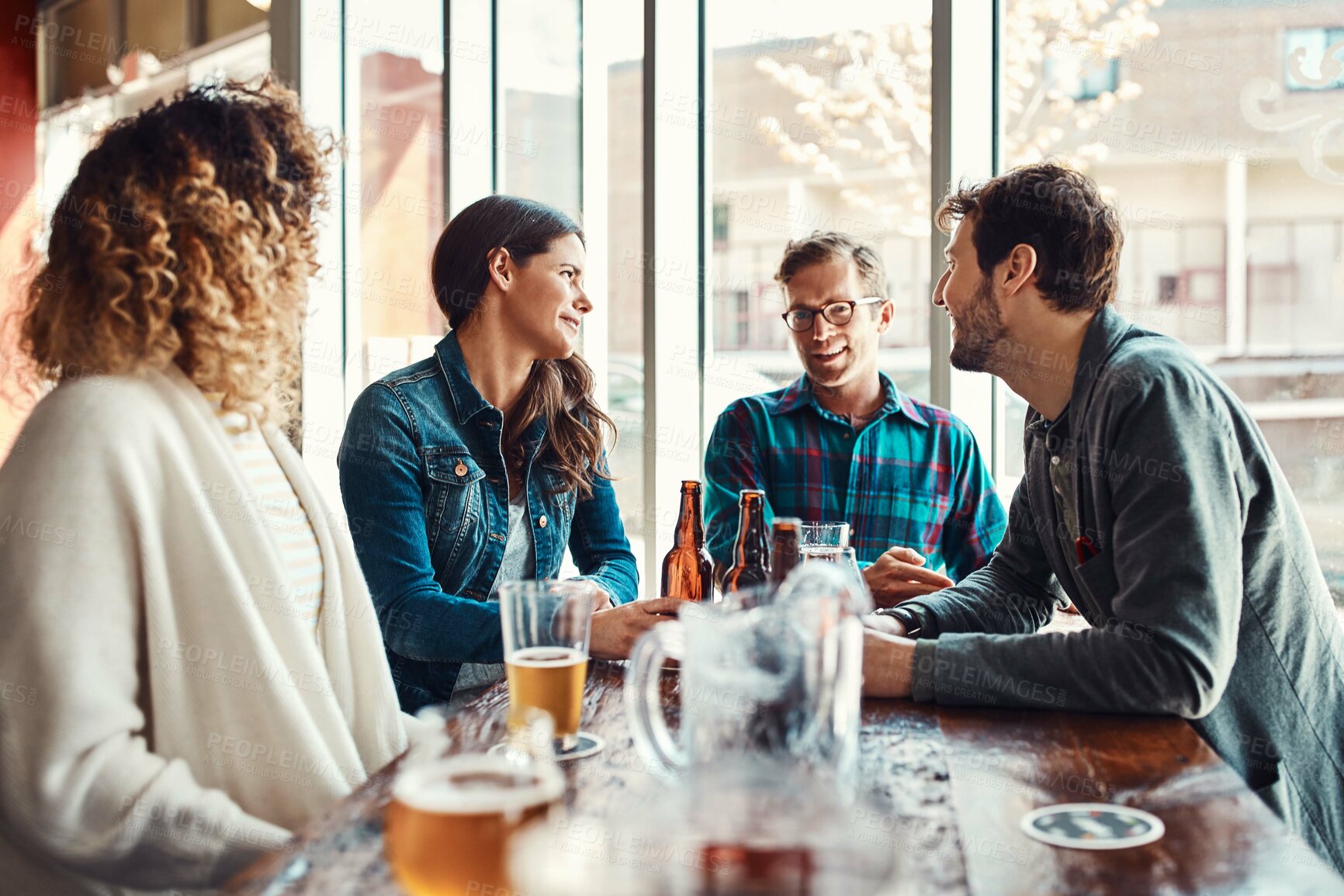 Buy stock photo Restaurant, beer and friends with smile in celebration of birthday event in urban New York pub. Group of people at hangout for happiness and gathering together with alcohol beverage at summer lunch