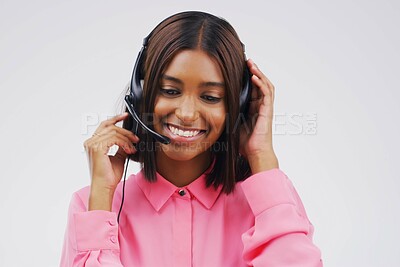 Buy stock photo Woman, headset and smile in call center on white background with happy telemarketing operator. Customer support, consulting and technology or voip for contact on internet with telemarketer in London