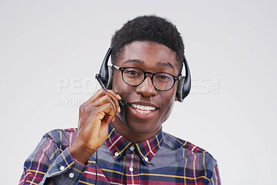 Buy stock photo African man, portrait and studio with headset for customer service or call center, smile for communication. Male person, white background and microphone with happiness for chat or telemarketing