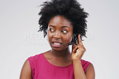 Buy stock photo Black woman, talking or listening with headset in studio background for consultant, call centre or crm. Female person, conversation and headphones with mic for support, connectivity and communication