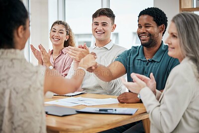 Buy stock photo Creative team in meeting clapping and giving a handshake for a promotion and welcome. Diversity, professional and corporate group celebrating successful teamwork in corporate office boardroom.
