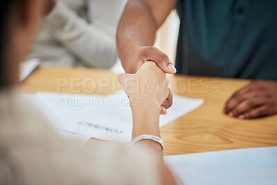 Buy stock photo Handshake, contract deal or negotiation closeup at desk at a meeting between professionals. Business greeting, thank you or welcome gesture to show respect with new partnership or onboarding.