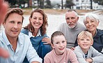 Family, beach and smile for selfie together for quality bonding time, holiday or vacation in the outdoor. Happy parents, grandparents and child smiling for photo on smartphone at the ocean in Greece
