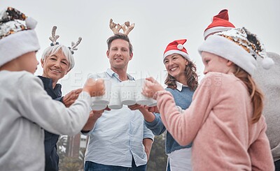 Buy stock photo Christmas, celebrate and happy family on holiday travel vacation bonding together with drinks. Grandparents, parents and kid celebrating, quality time December festive drinking hot chocolate outdoors