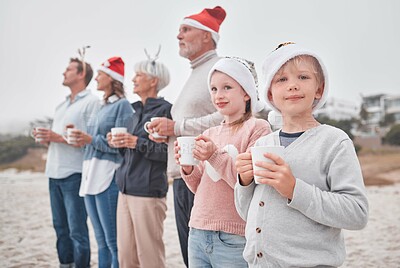 Buy stock photo Love, Christmas and freedom for happy family at the beach drinking eggnog, coffee or tea on big family vacation. Festive quality time for grandparents, parents and kids bonding on Amsterdam holiday