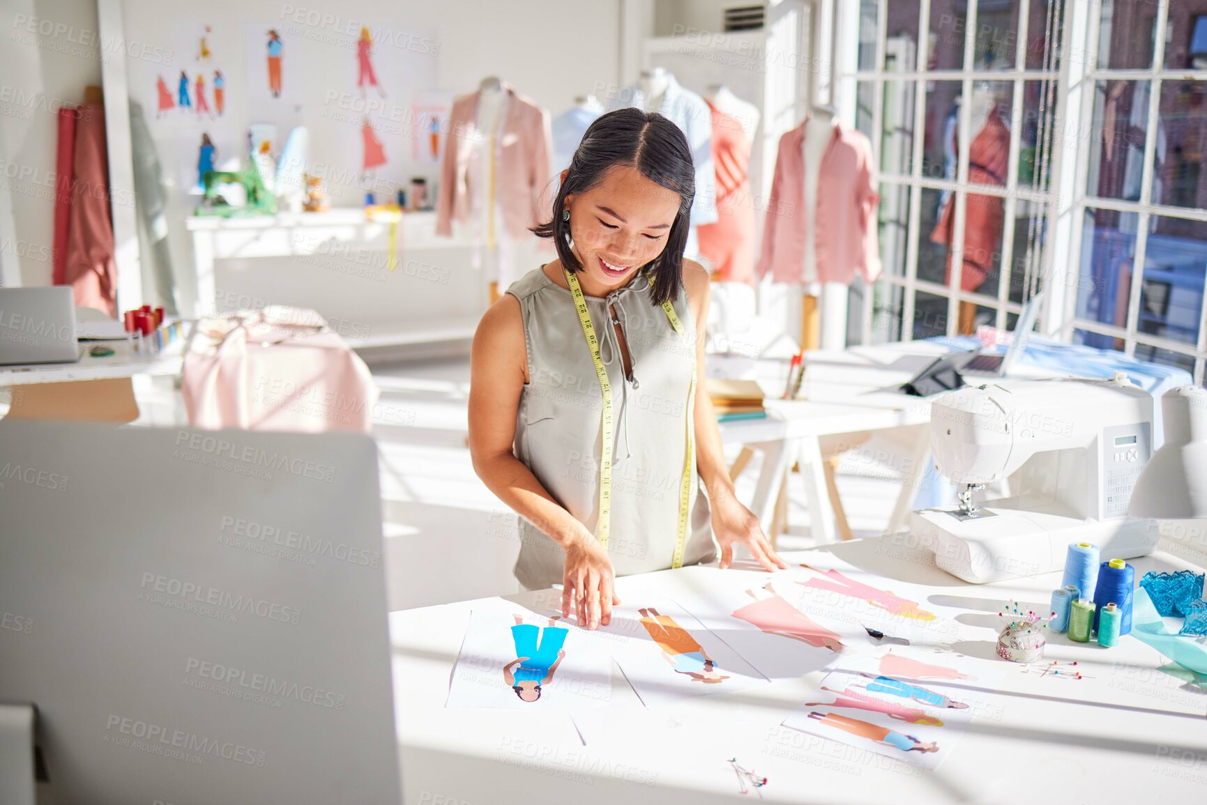 Buy stock photo Fashion designer, drawing and asian woman, creative sketch of clothes and industrial tailor manufacturing in textile startup studio. Happy woman, artist and illustration, paper and color swatch ideas