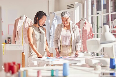 Buy stock photo Teamwork, collaboration and fashion designer team working on a new collection, planning and sharing vision in a design studio. Partnership, women and creating thinking for fashion, clothing and idea