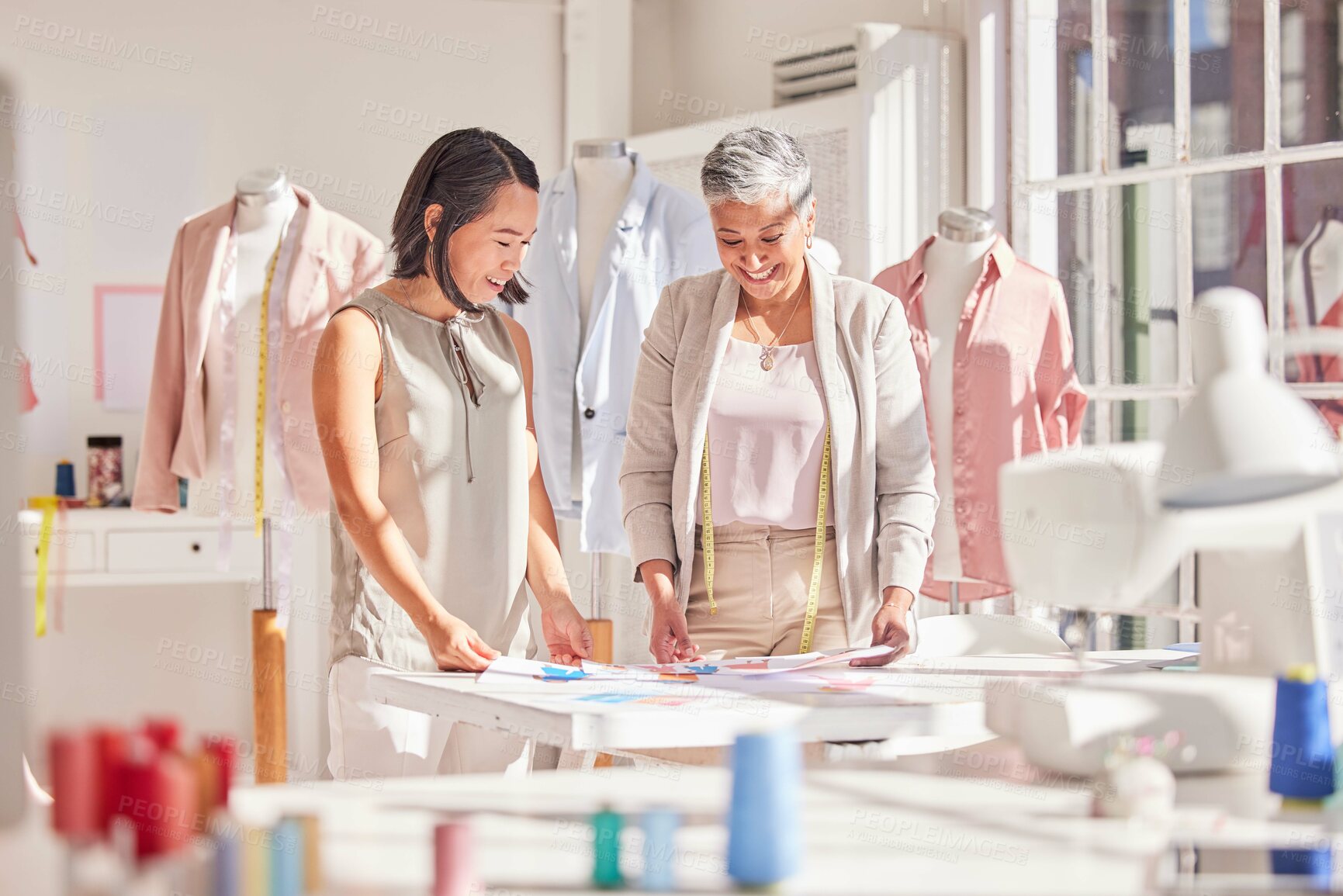 Buy stock photo Teamwork, collaboration and fashion designer team working on a new collection, planning and sharing vision in a design studio. Partnership, women and creating thinking for fashion, clothing and idea