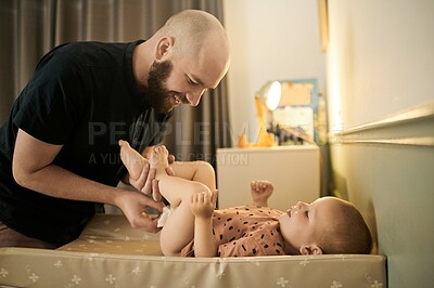 Buy stock photo Baby, cleaning and a man changing a diaper in the nursery of his home as a single parent of a child. Family, kids and a father with his small infant to change a nappy for hygiene or care in a house