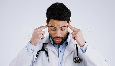 Buy stock photo Man, doctor and headache in stress, anxiety or burnout for overworked against a white studio background. Male person, medical surgeon or nurse with migraine in depression, mental health or pressure
