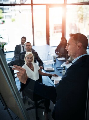 Buy stock photo Business people, presentation and man with brainstorming, coaching and feedback with proposal. Group, employees and mentor with information, meeting and planning with vision for company and teamwork