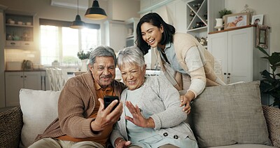 Buy stock photo Video call, living room and woman with senior parents on a sofa relaxing and talking on a phone. Smile, bonding and female person with elderly people on virtual conversation with cellphone at home.