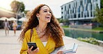 Education, laughing and phone with student woman on campus of college or university for learning. Books, development and funny with happy person outdoor at school for growth, scholarship or study