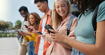 Buy stock photo Hands, students and group with phone at college, smile and texting with social media, app or communication, Men, women and diversity with smartphone, happy and web chat with search for funny meme