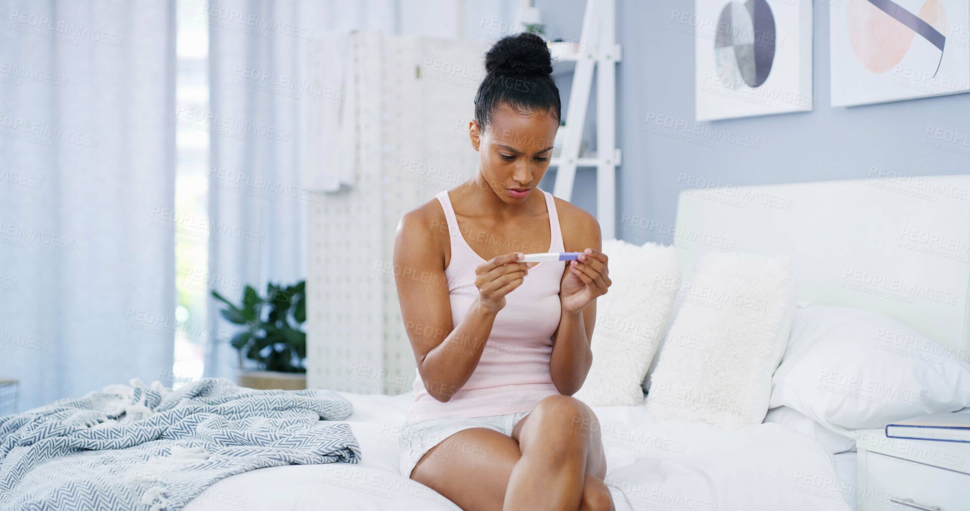 Buy stock photo Stress, anxiety and woman on bed with pregnancy test, health and wellness in apartment. Pregnant, news and African girl in bedroom waiting for results with doubt, worry and future motherhood in home
