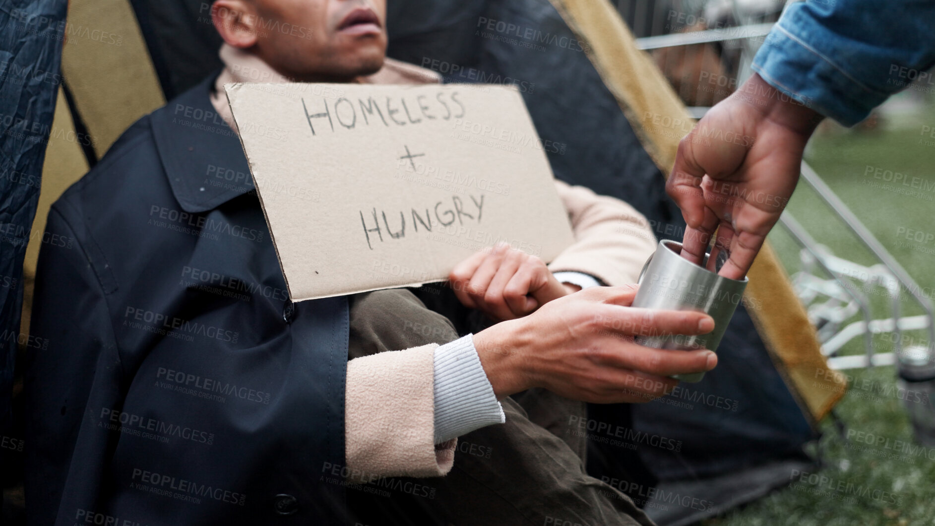Buy stock photo Homeless, person and hands with sign for money with financial donation, compassion and assistance. Beggar, hungry and board by tent with vulnerability, struggle and help with cash for poverty support