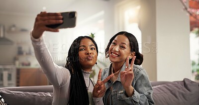Buy stock photo Happy women, friends and peace sign with selfie on sofa for picture, photography or memory at home. Female people, user or smile with emoji for capture moment, social media or post on couch at house