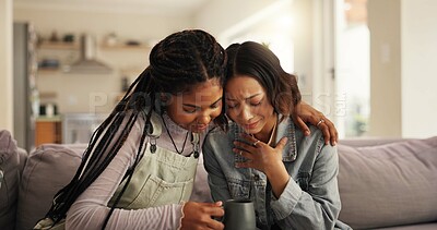 Buy stock photo Women, friends and sad with support on sofa for comfort, understanding or sympathy at home. Female people, confession or upset with drink, breakup or empathy for friendship, soothing or care at house