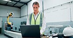 Engineer, laptop and woman with robotics for manufacturing or assembly line in factory. Computer, automation and worker research for production process, industry 4.0 or programming high tech software