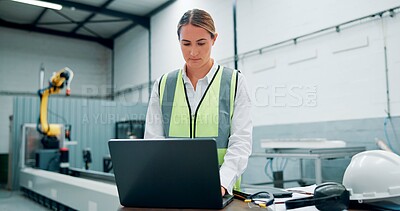 Buy stock photo Engineer, laptop and woman with robotics for manufacturing or assembly line in factory. Computer, automation and worker research for production process, industry 4.0 or programming high tech software