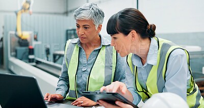 Buy stock photo Laptop, engineer team and women in meeting for planning, discussion or communication at factory. Female employees, collaboration and brainstorming for robotics with tech, software and programming