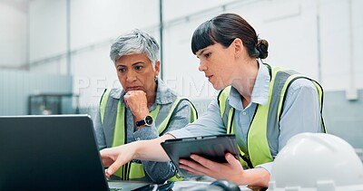 Buy stock photo Women, engineer and pointing with laptop at factory for planning, supply chain or inventory management. People, tablet and teamwork for manufacturing, logistics feedback and information of production