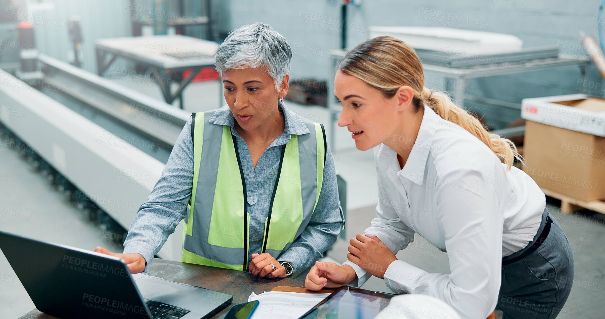 Buy stock photo Women, engineer team and laptop in meeting for planning, discussion or communication at factory. Female employees, collaboration and brainstorming for robotics with internet, software and programming